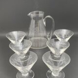 Glass and carafe set with chiseled flower motif