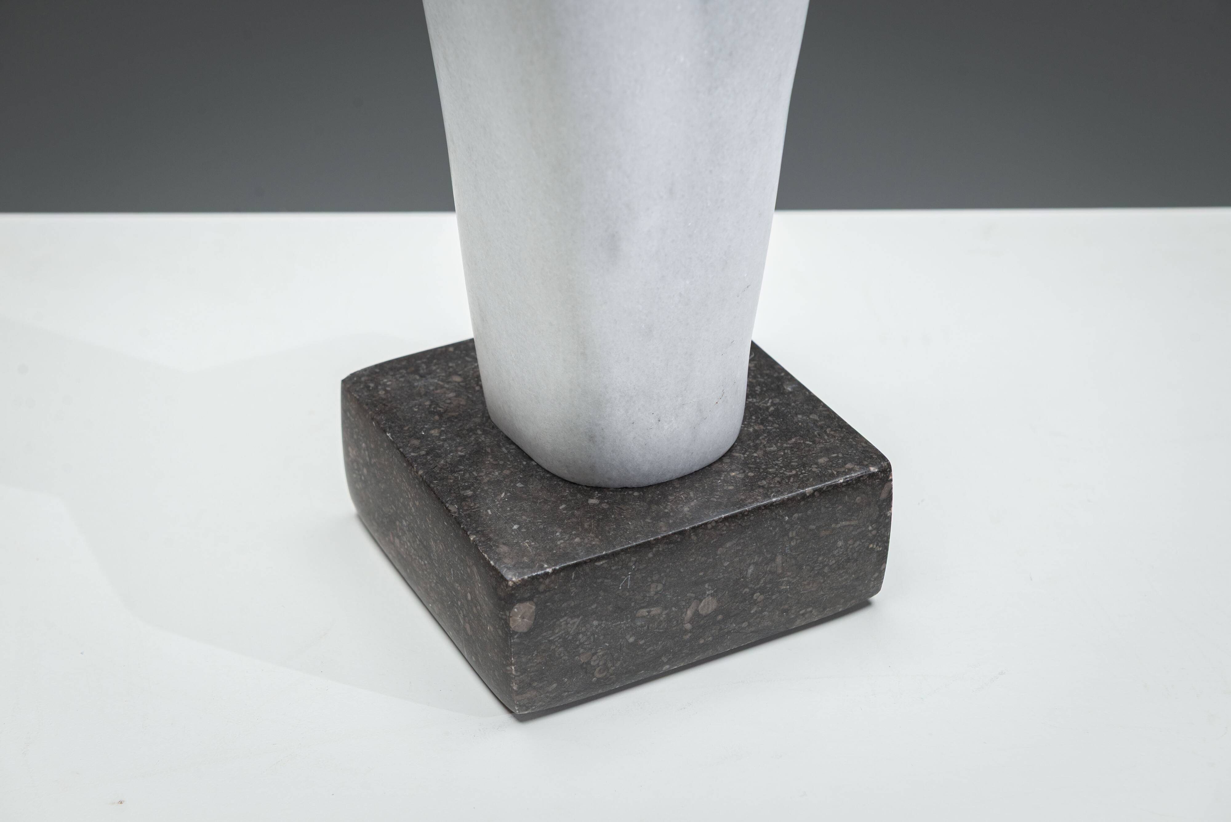 Abstract solid white marble torso