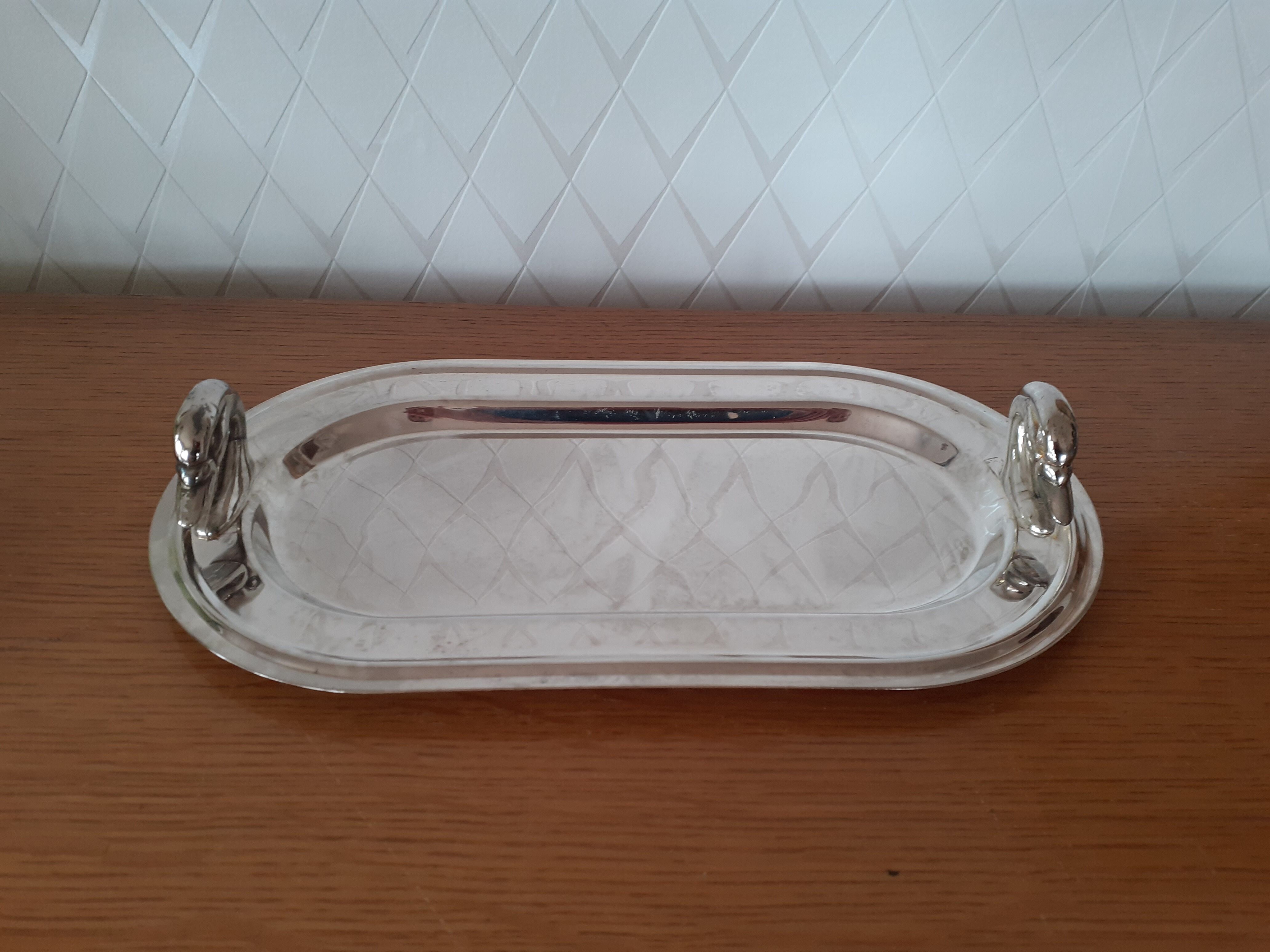Two foie gras dishes and their toast holder