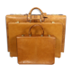 Ensemble de trois valises en cuir vintage