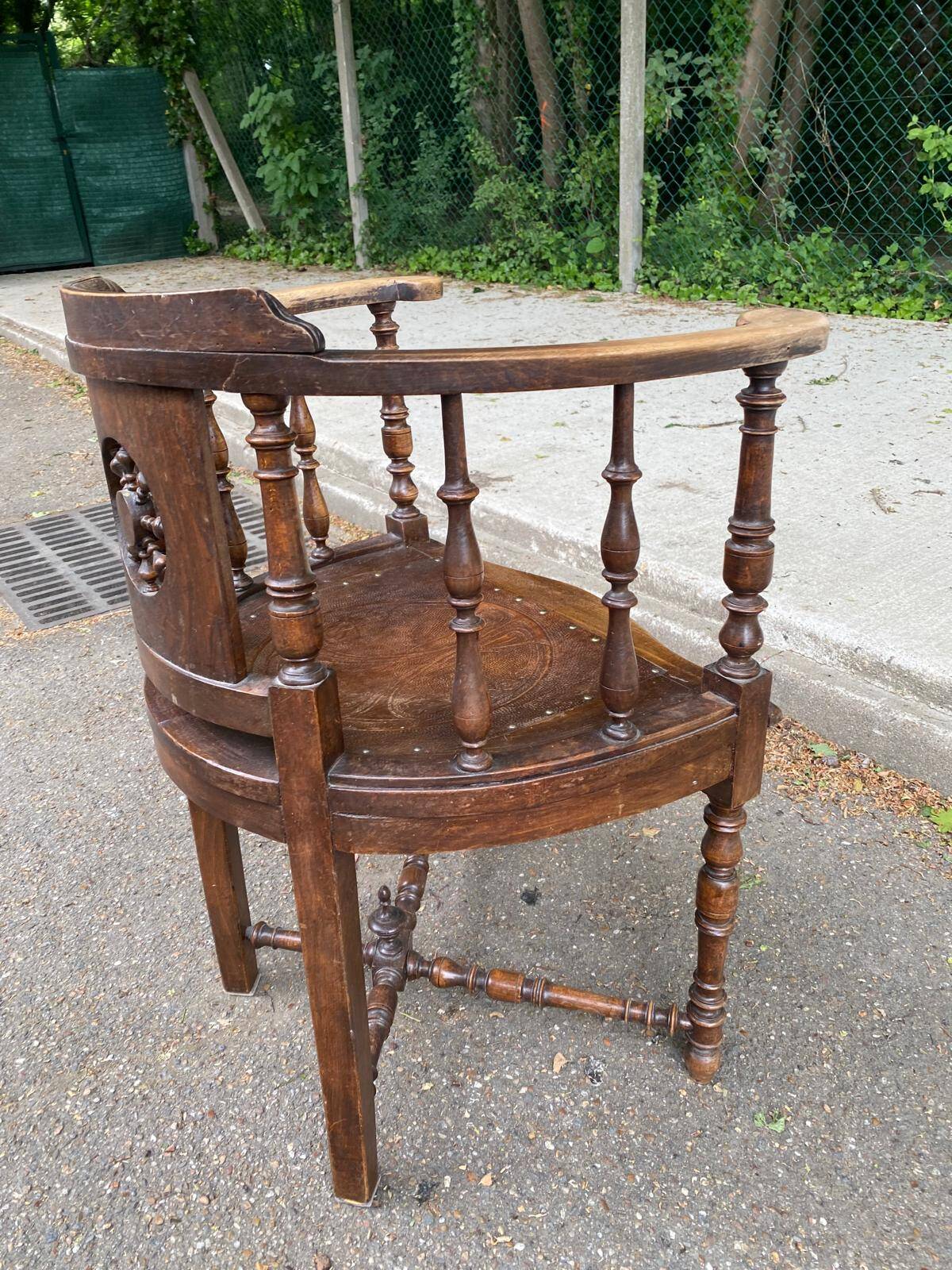 18th century Breton office chair in solid curved and carved wood