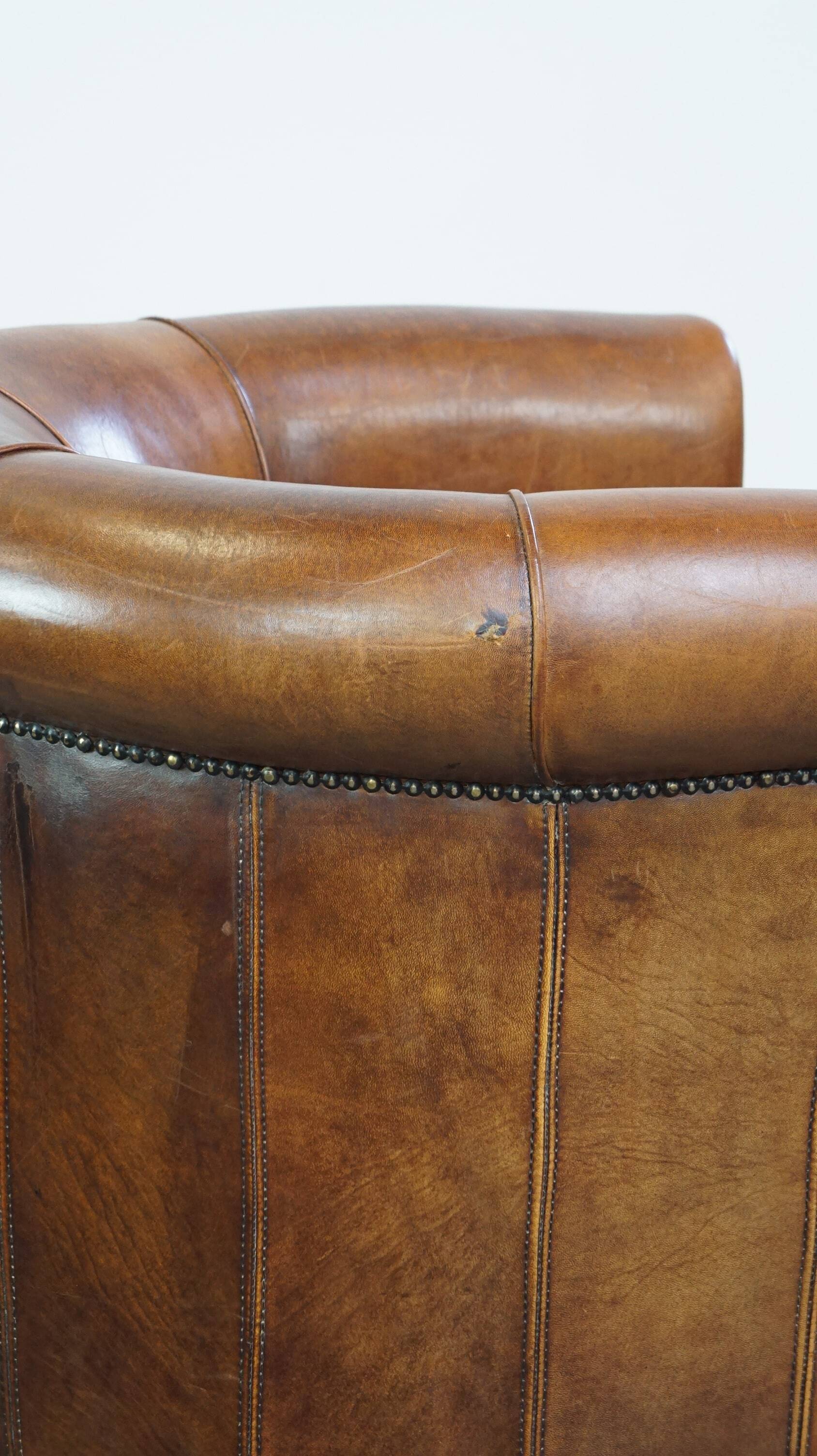 Brown leather club chair