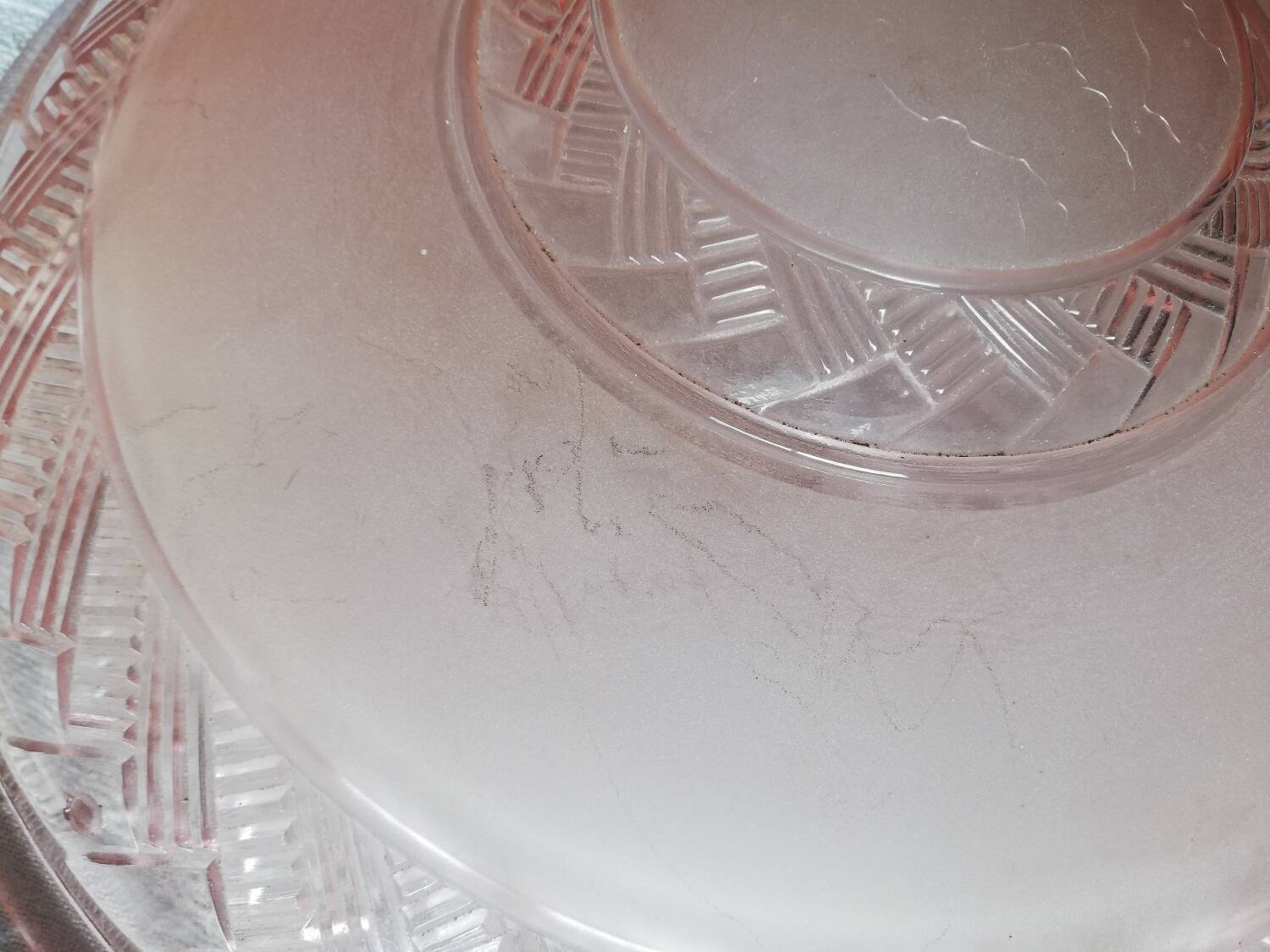 Antique ceiling light in frosted and engraved pink glass.