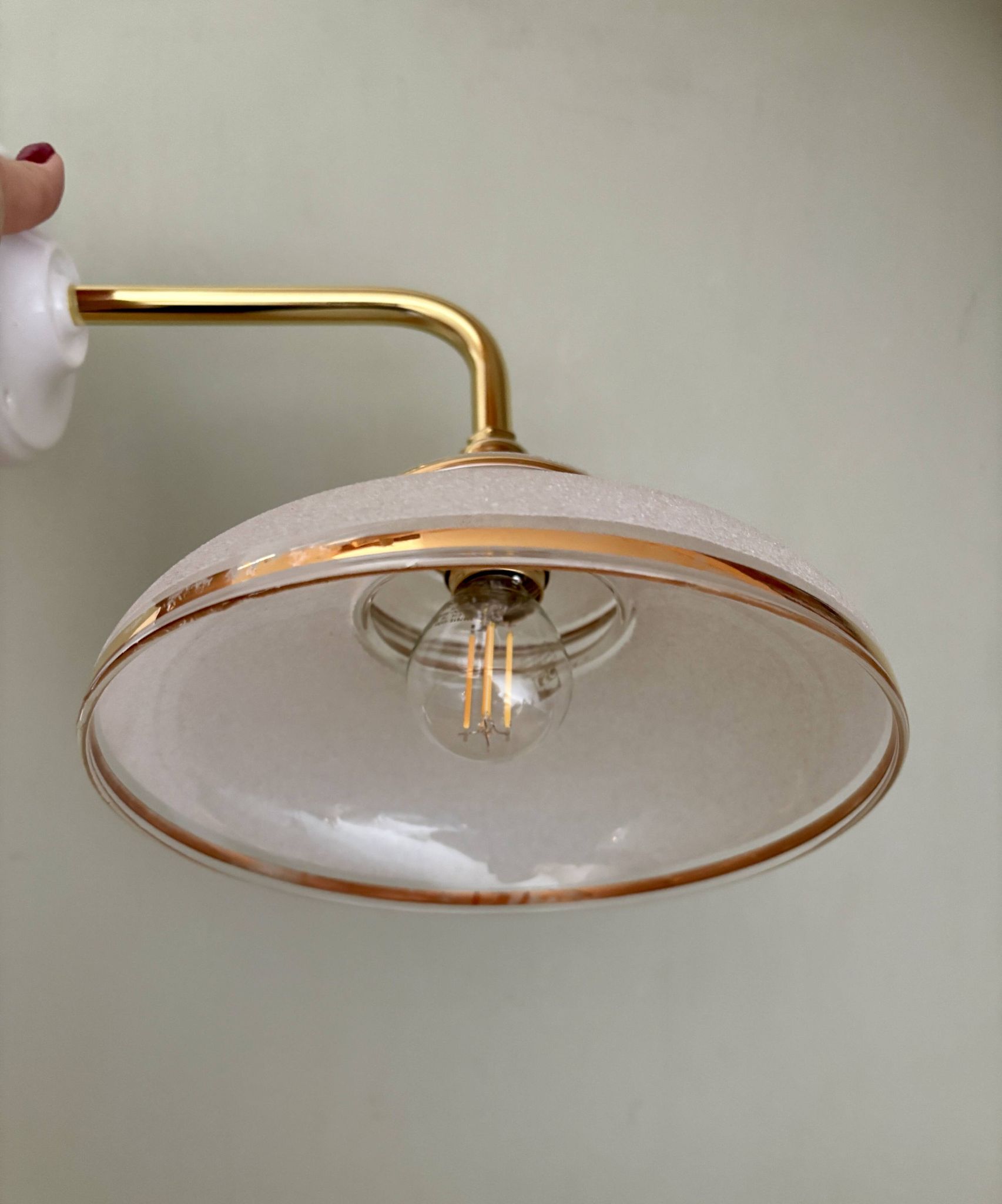 Vintage elbow wall lamp with white and gold granite glass shade