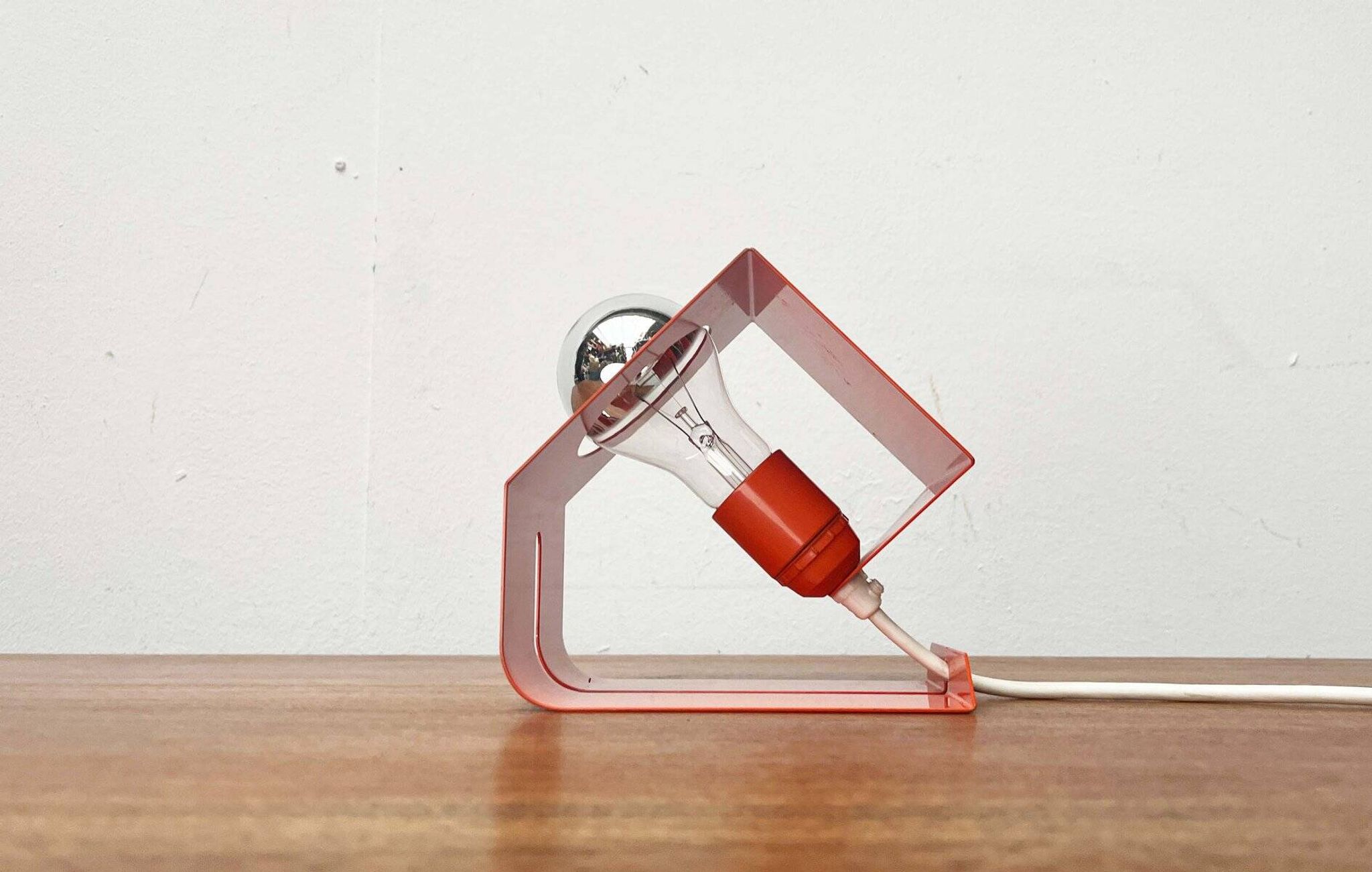 Orange metal table lamp, minimalist, modern mid-century space age, 1960s.