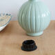 Pied de lampe, ancienne bouteille en verre peint