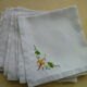 Set of 6 napkins in white linen embroidery in an angle