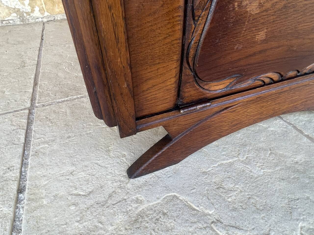 Art Deco bedside table in walnut, black marble top, circa 1920.
