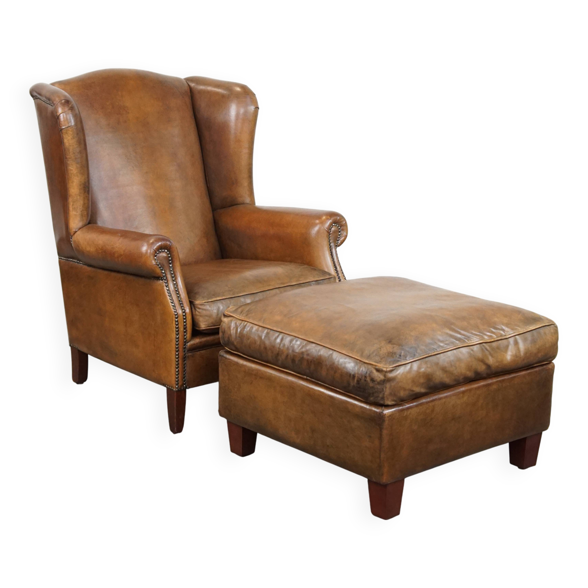 Sheepskin wing chair + XXL patinated footrest