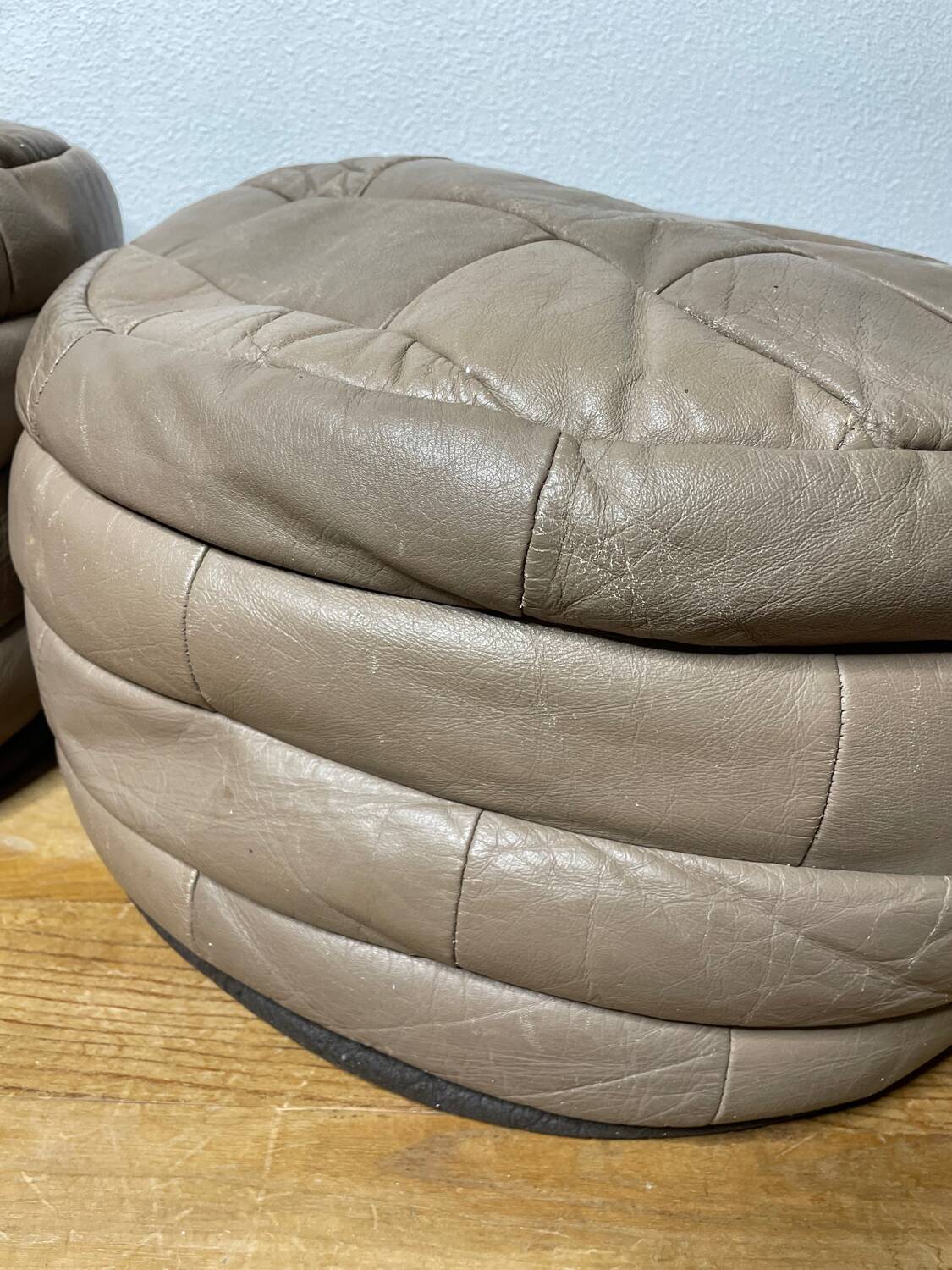 Pair of De Sède patchwork leather poufs