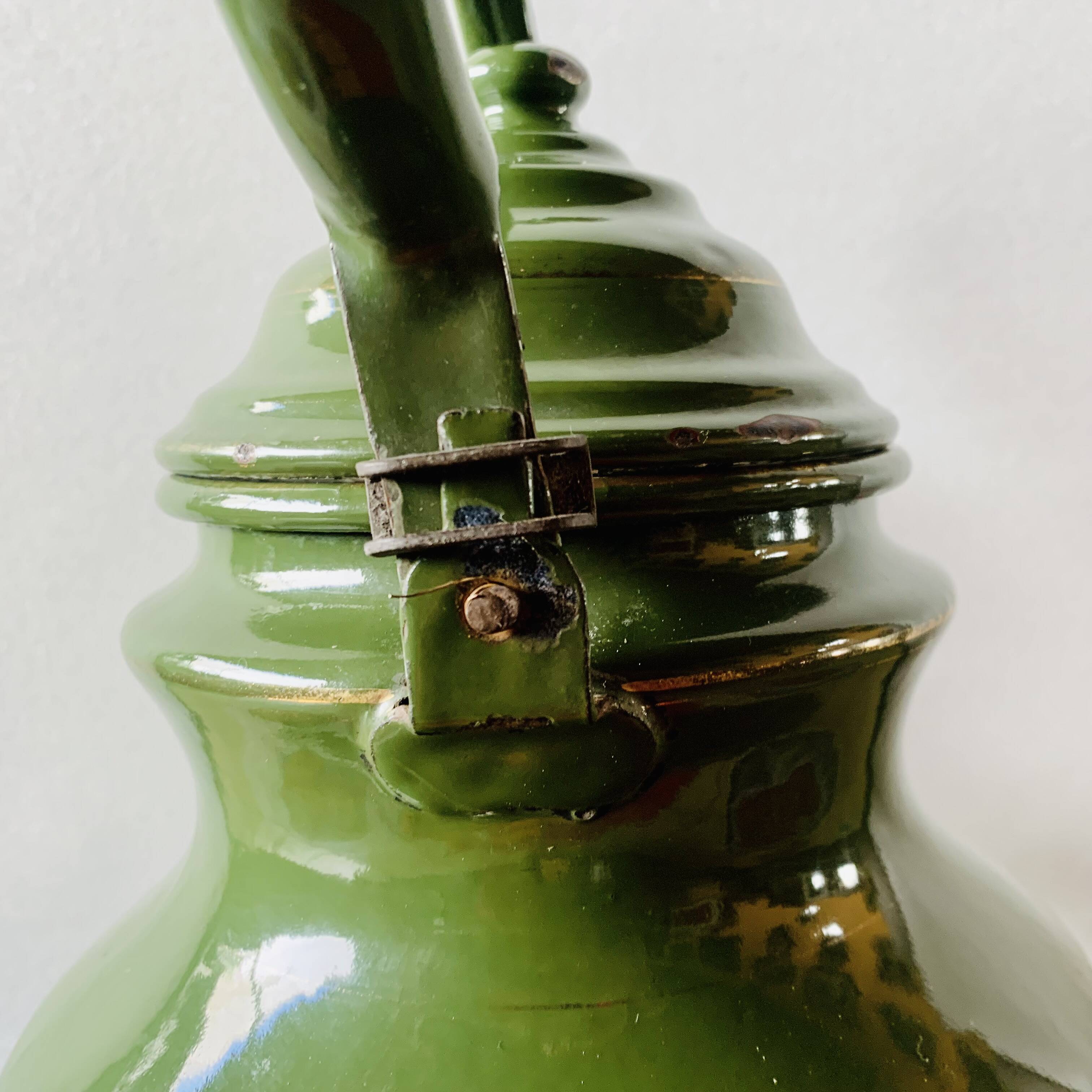 Vintage green enameled sheet metal kettle