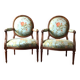 Paire de fauteuils à dossier médaillon de style louis XVI