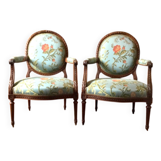 Pair of medallion back armchairs in Louis XVI style
