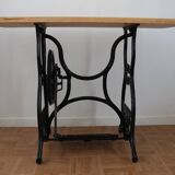 Living room console with sewing machine foot