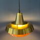 Mid-century Danish style orange brass suspension light.