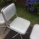 Vintage swivel chairs with chrome tubular base and silver skaï brand unic desing.
