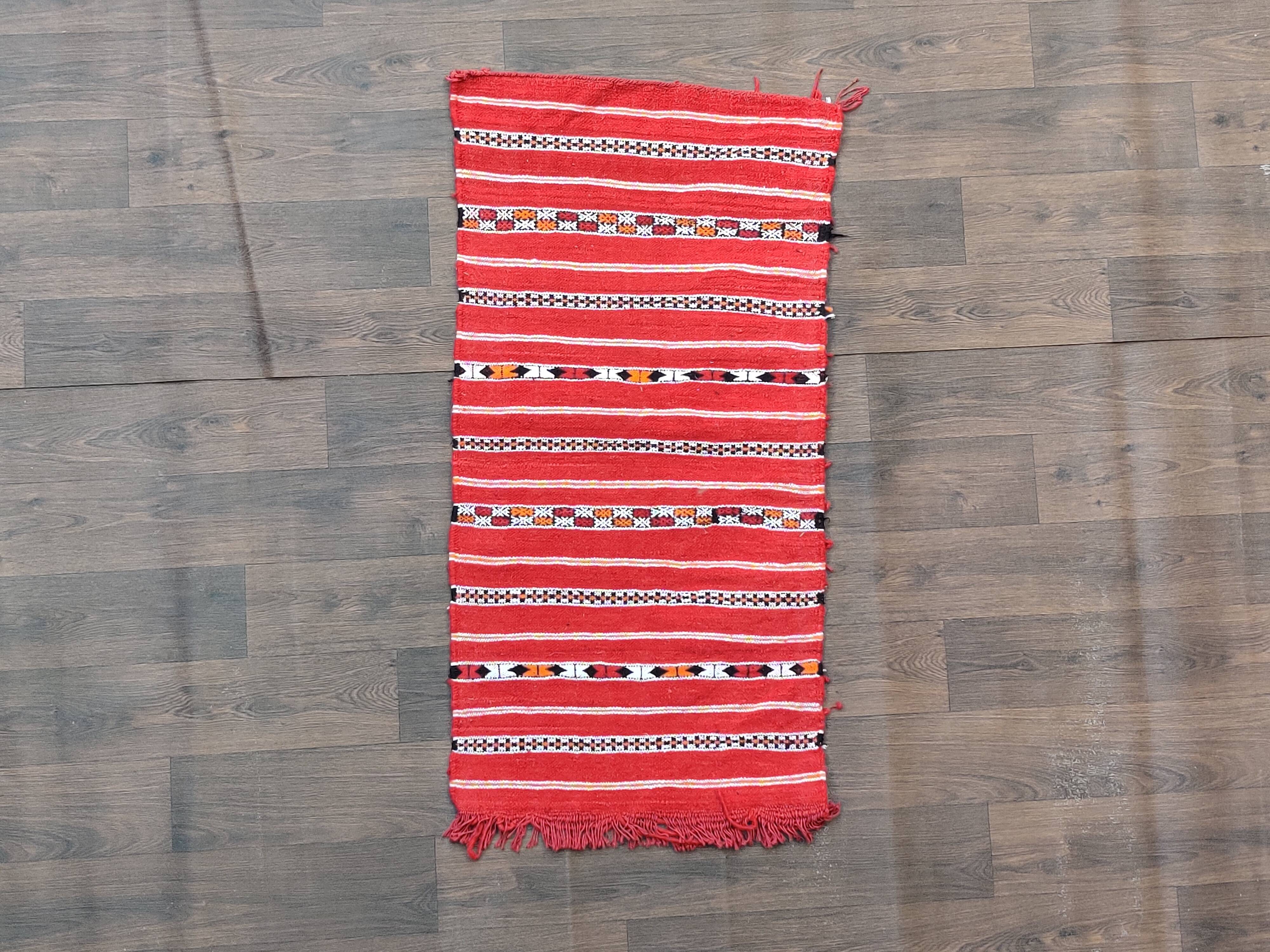 Red Moroccan kilim carpet