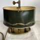 A pair of old brass bed warmers.