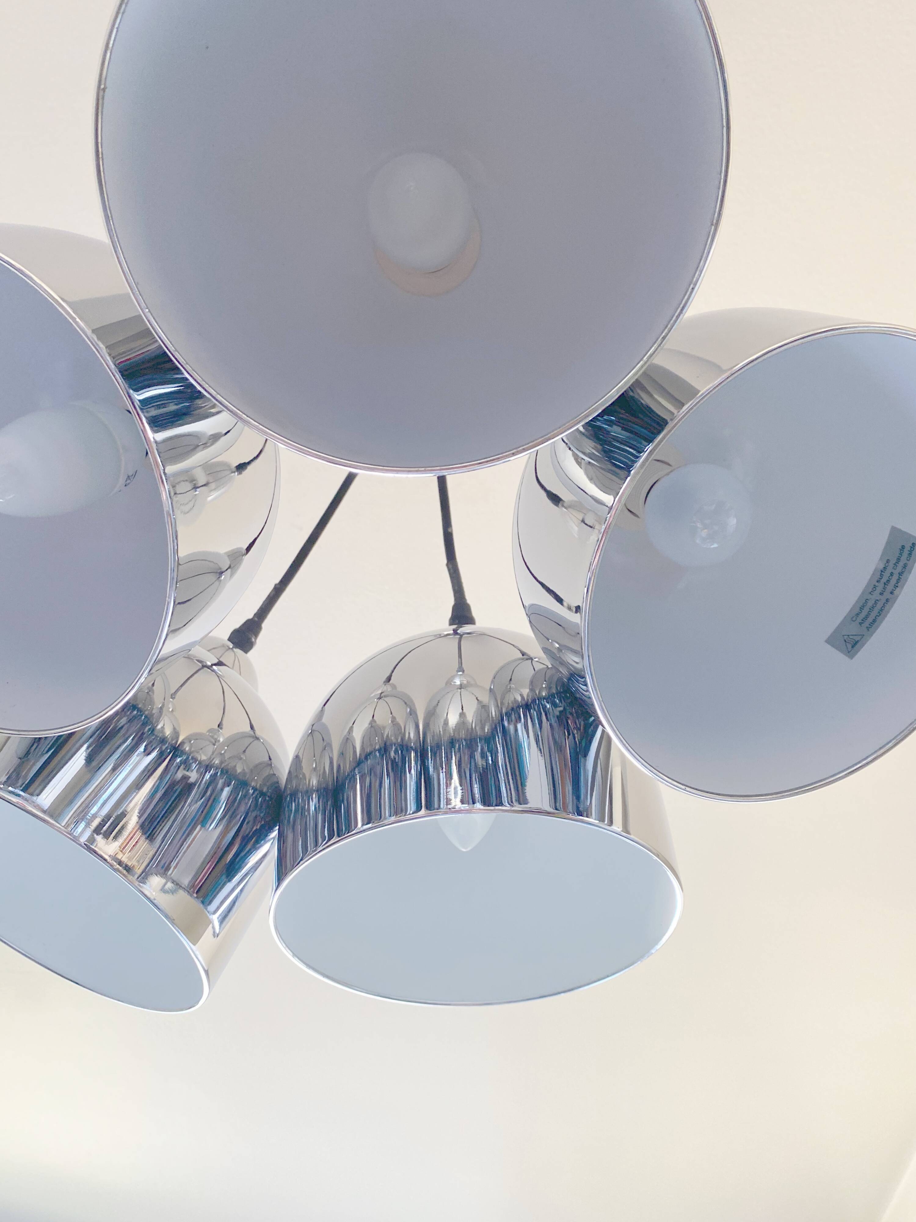 Suspended bell luminaires