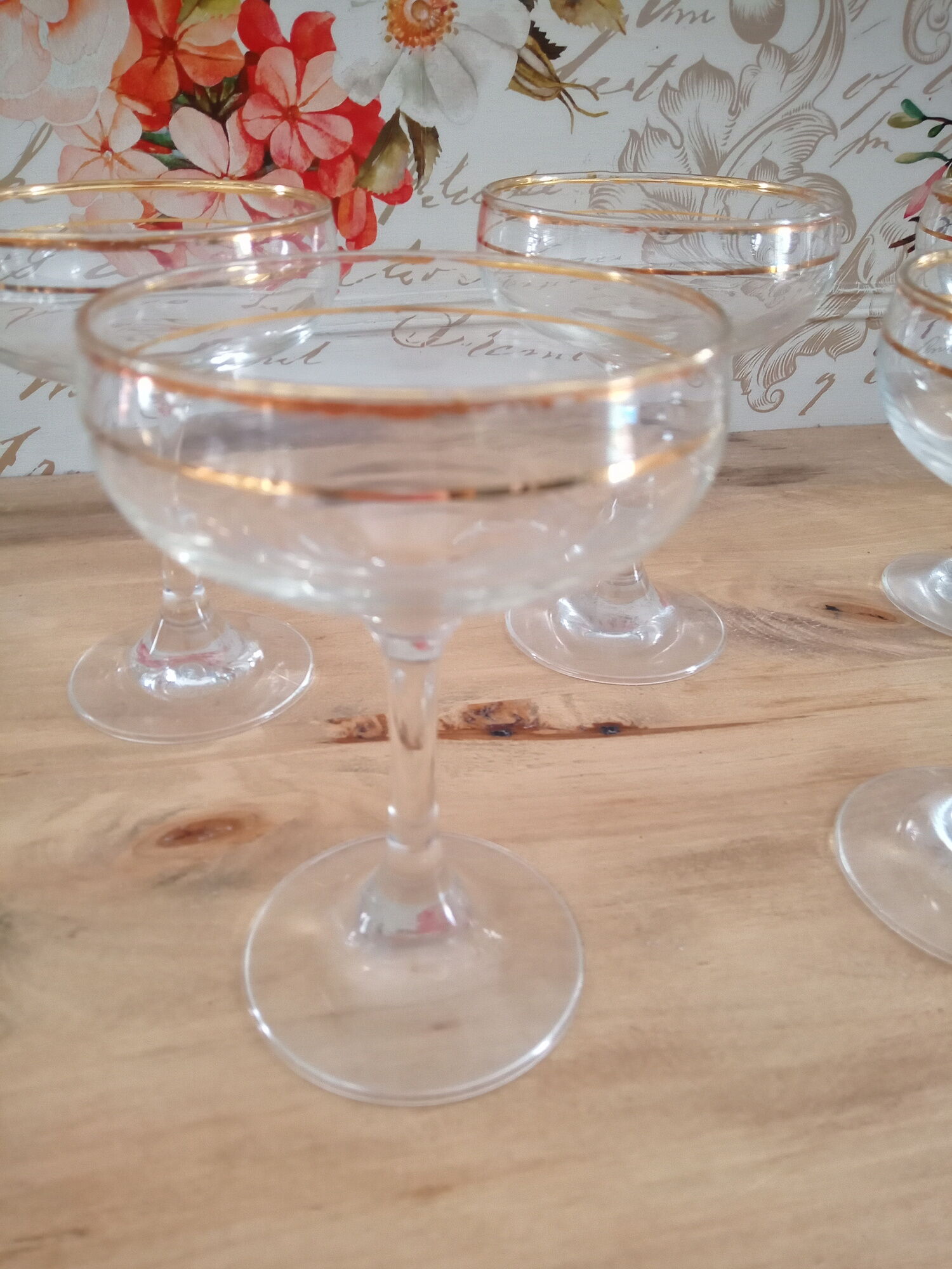 Lot of 5 glass champagne glasses and gold eders