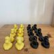 Box of 12 dog-shaped cutlery rests in yellow and black majolica.