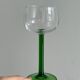 8 Alsatian stemmed glasses, transparent glass and green stems.
