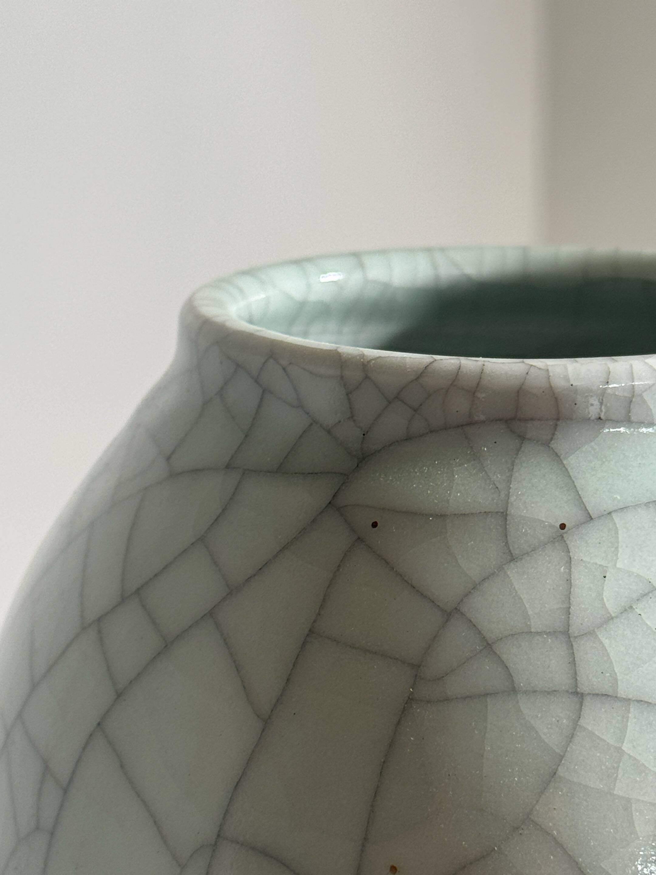 White ceramic vase by Roland Breton