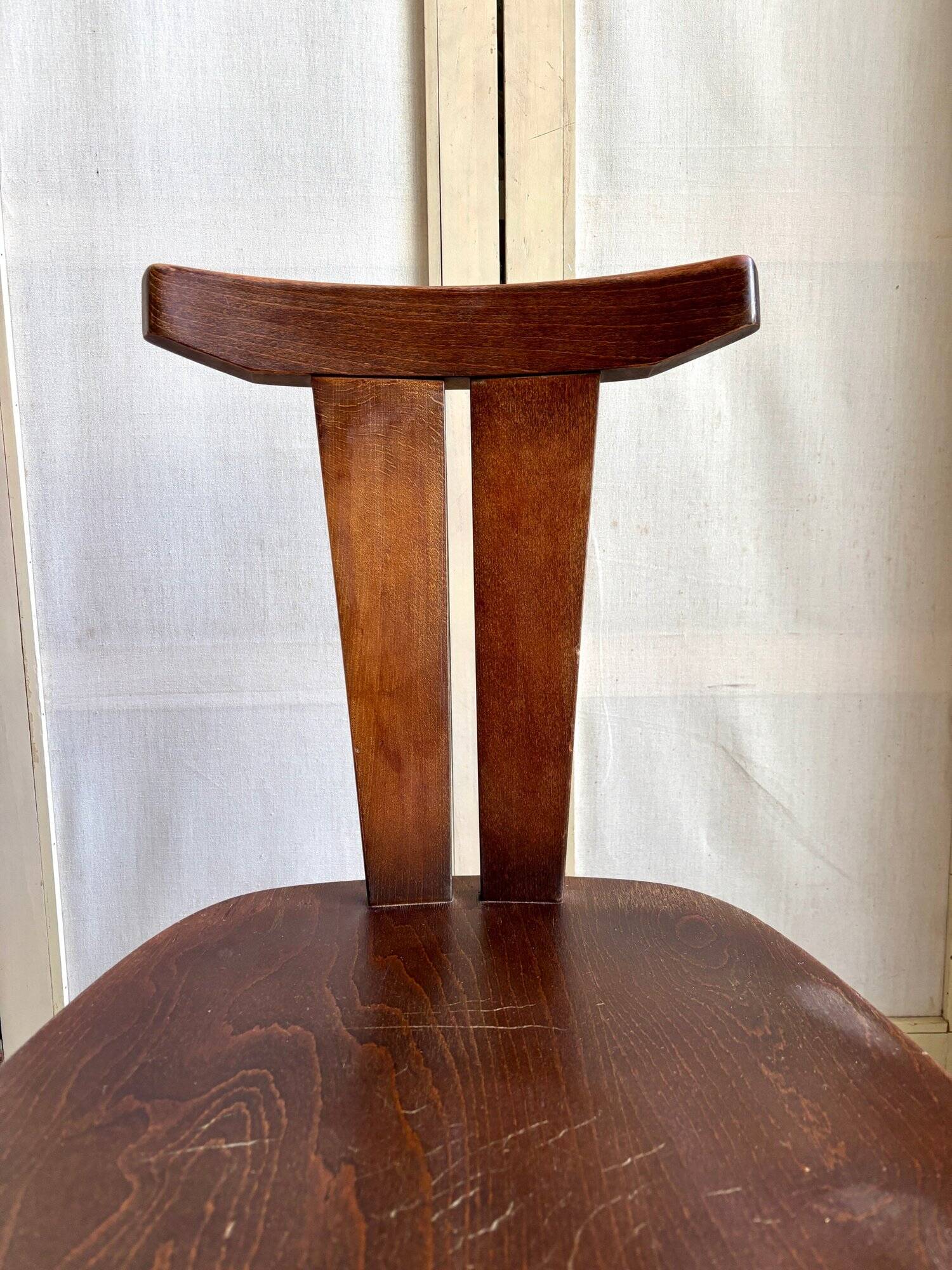 Brutalist chair in dark wood