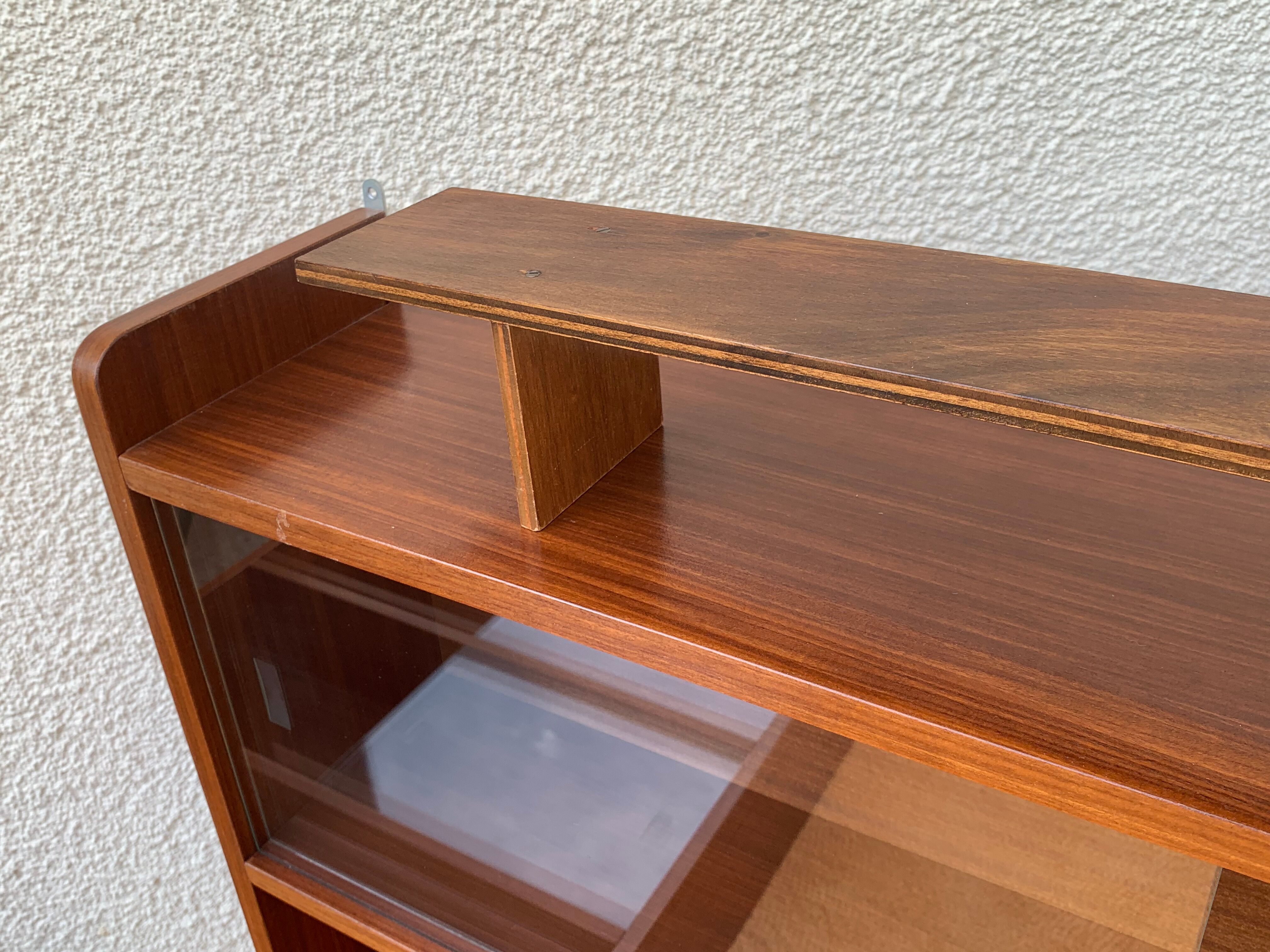 glass wall bookcase in vintage teak 1950