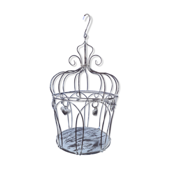 Decorative bird cage with iron hearts