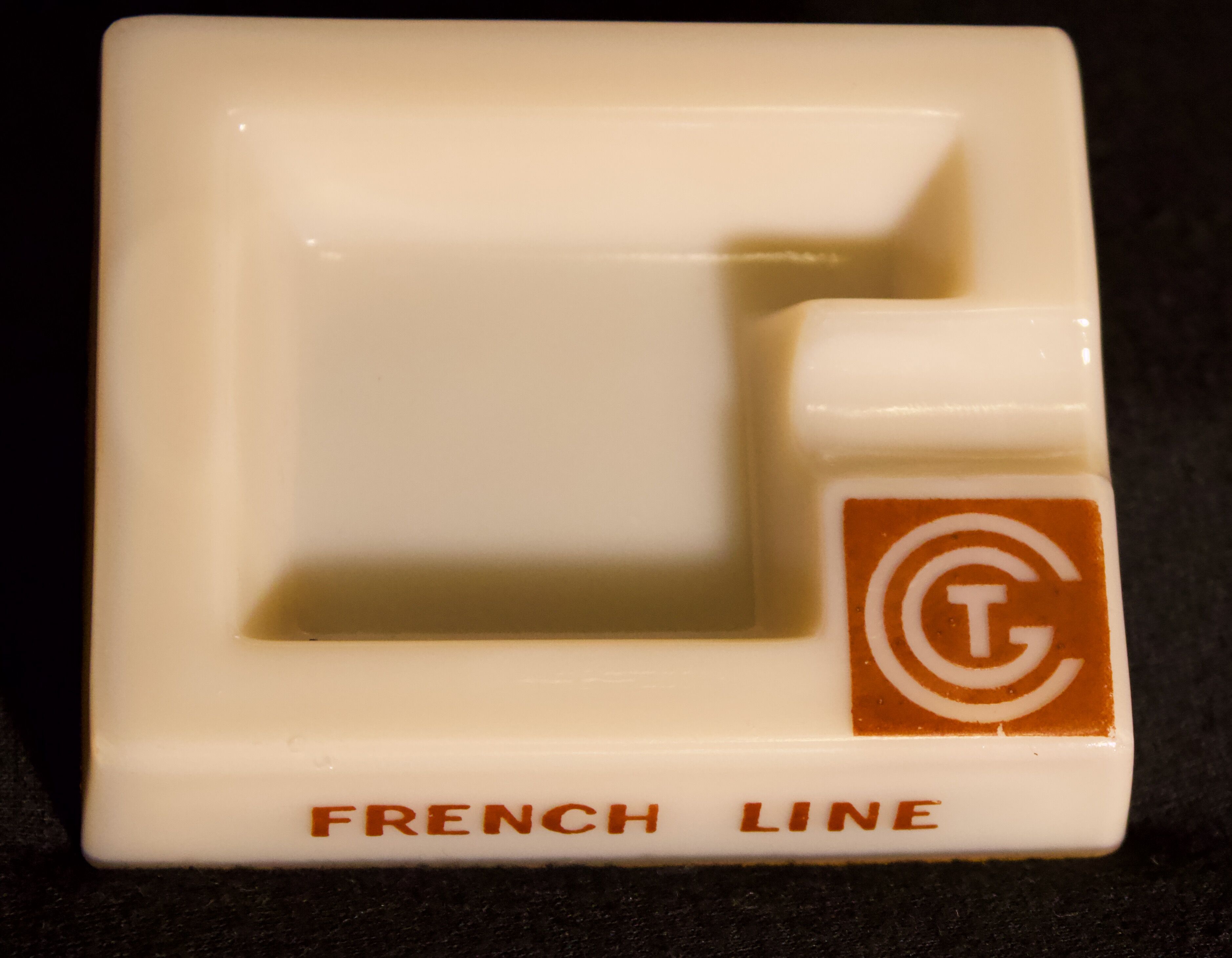 Three opalex ashtrays at the Logo of the Trans-Atlantic General Company - French Line - Model created by Jean Luce for the cruises of the liner Normandy and France
