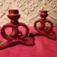 Pair of vintage ceramic candle holders, hand-painted in red and gold.