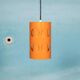 Vintage orange suspension light in a 1970s space age style.