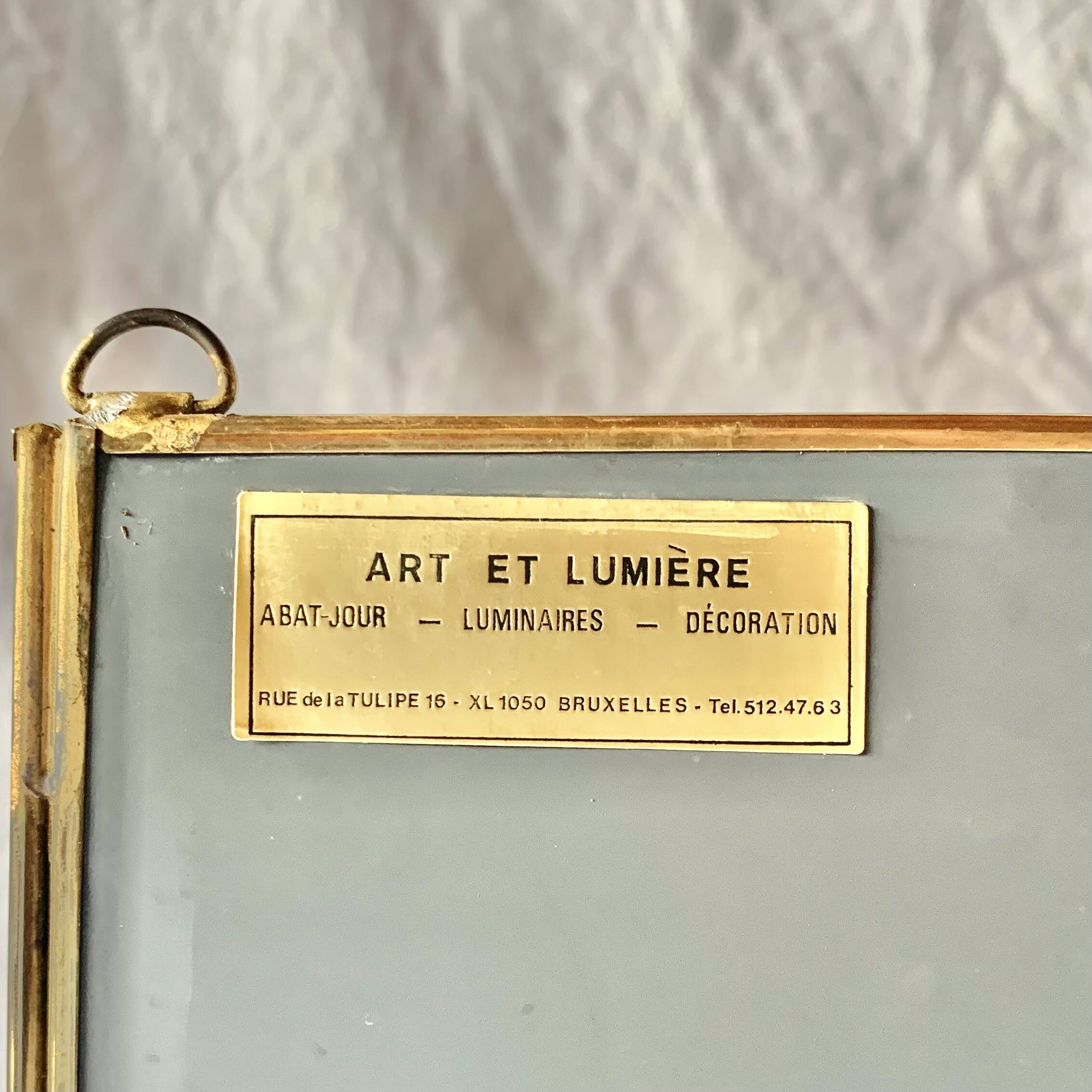 Small vintage display case in clear glass, mirrored glass and brass