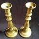 Former pair of bronze candlesticks