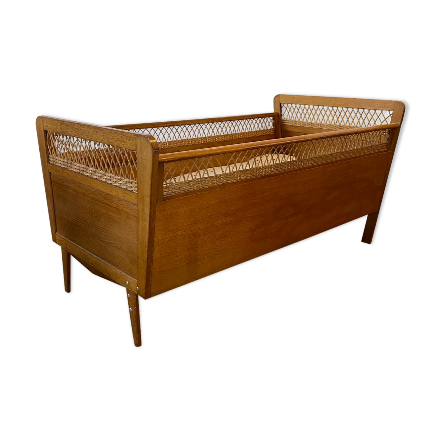 Wooden and wicker baby bed