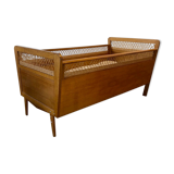 Wooden and wicker baby bed