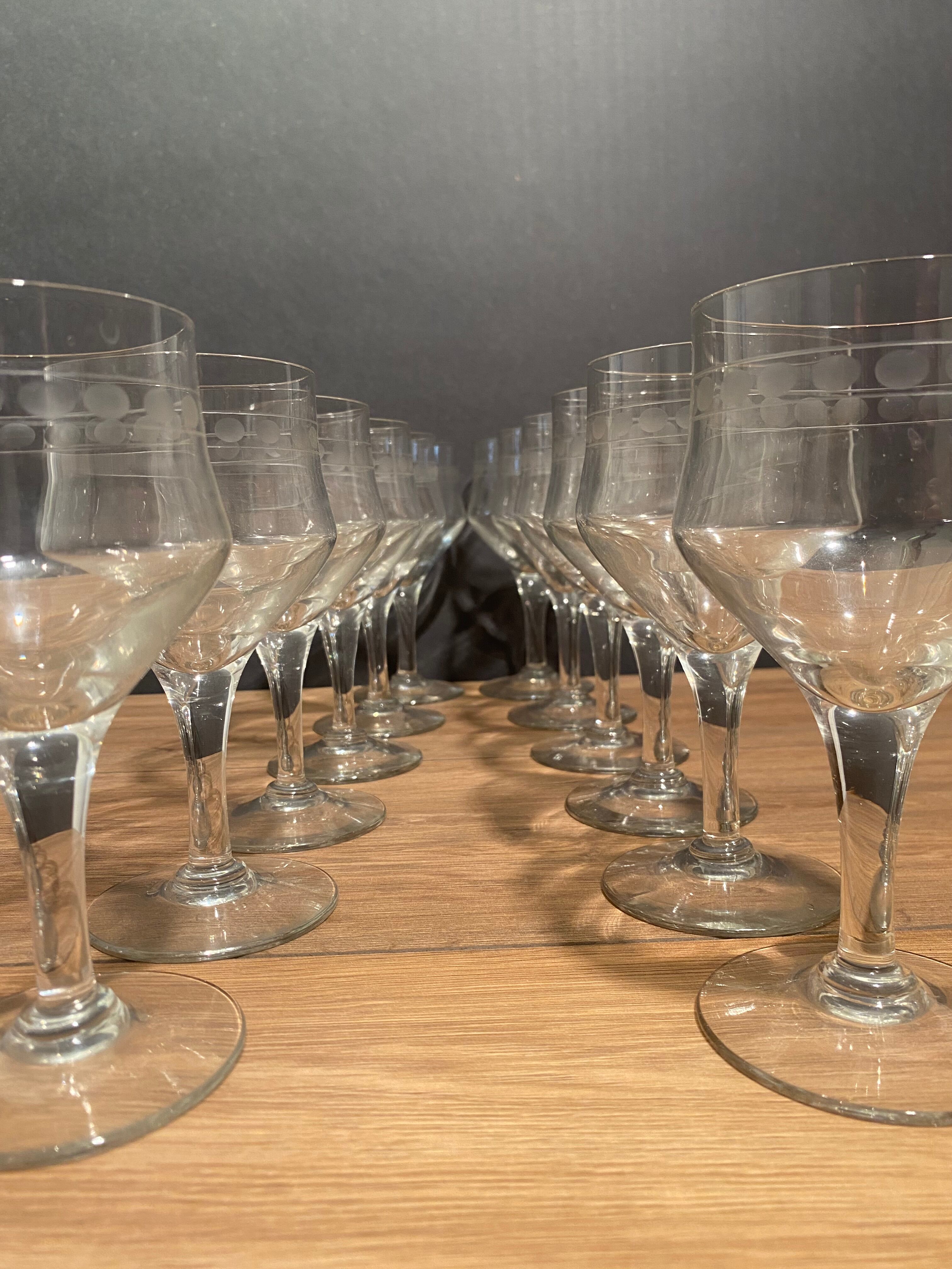 Suite of 12 glasses with feet in cut glass mid-twentieth century
