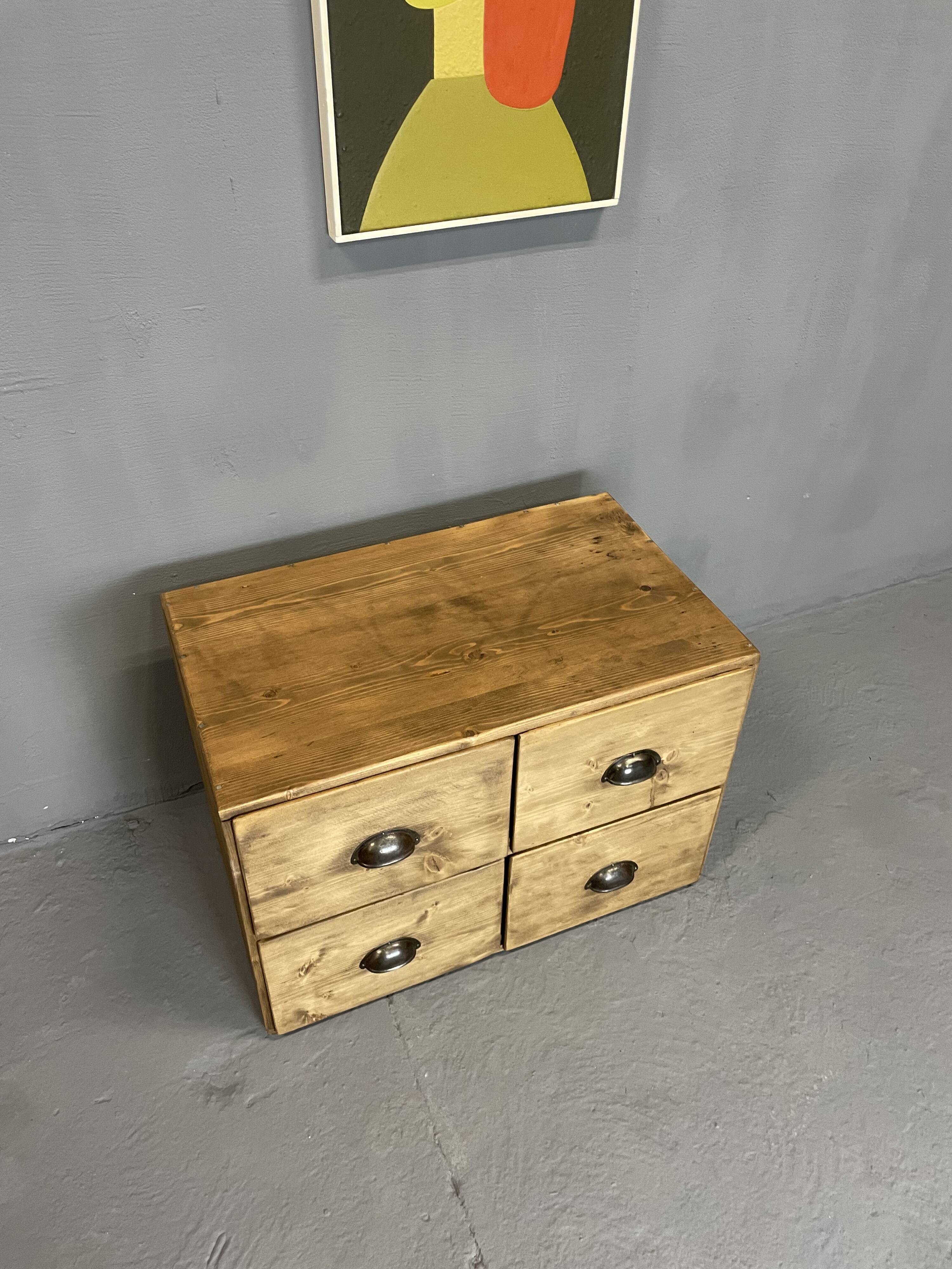 Small piece of furniture with 4 drawers