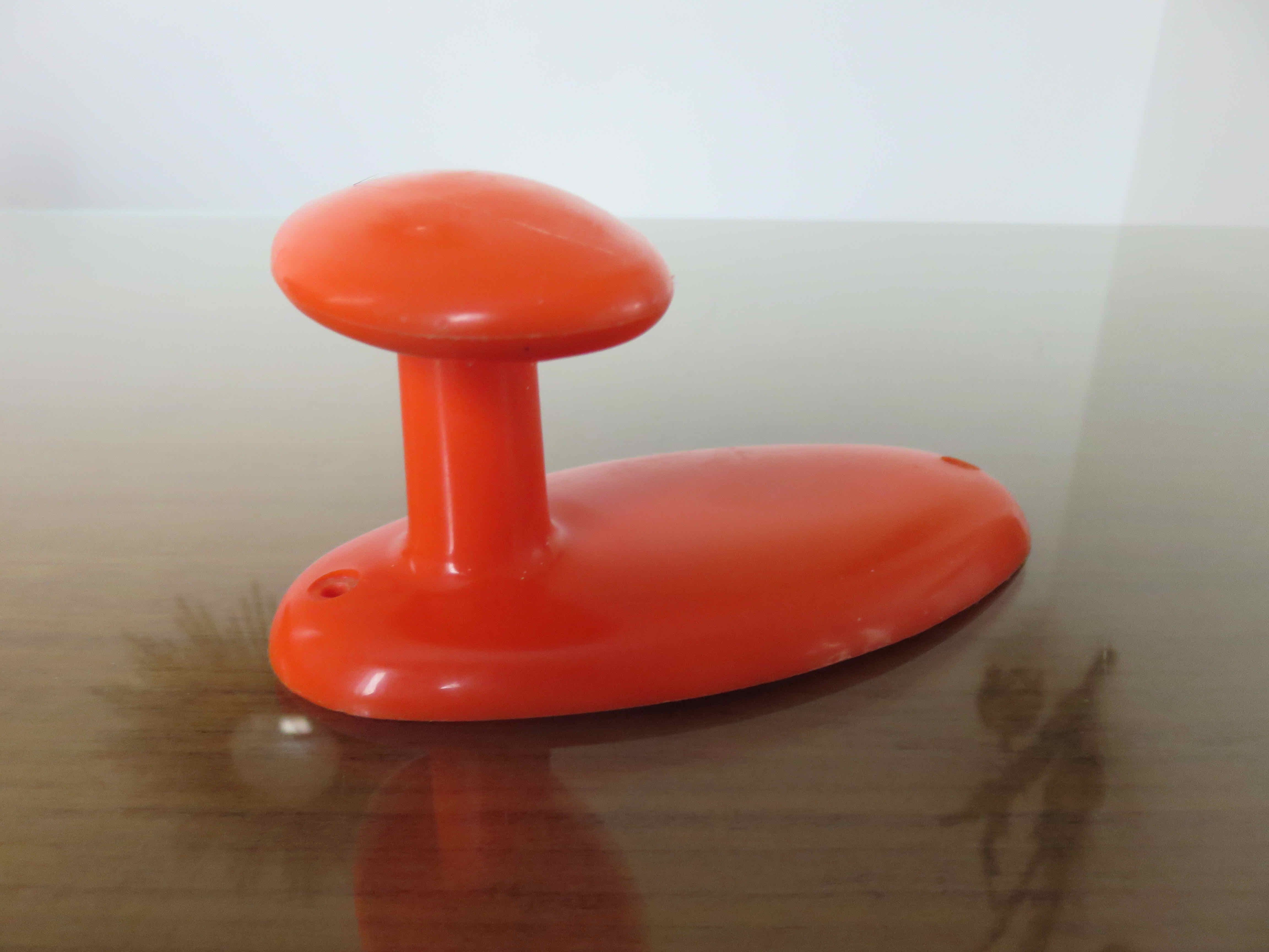 Orange plastic hook 70s