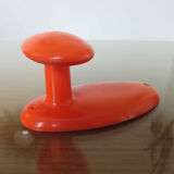 Orange plastic hook 70s