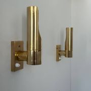 Pair of vintage adjustable brass wall lights, France 1970.