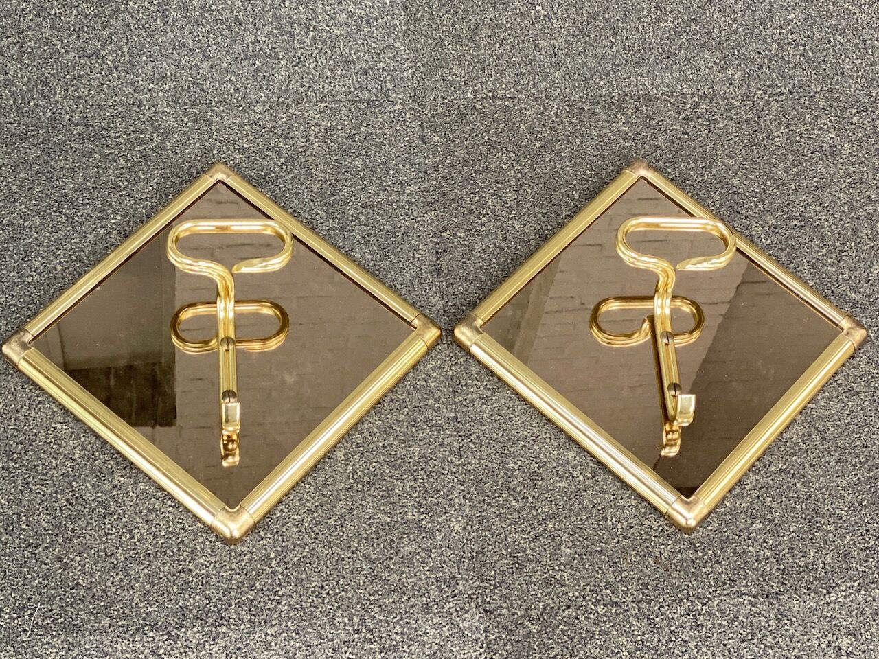 Pair of coat racks by Baller