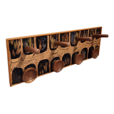 Vintage wooden coat hangers and glazed copper