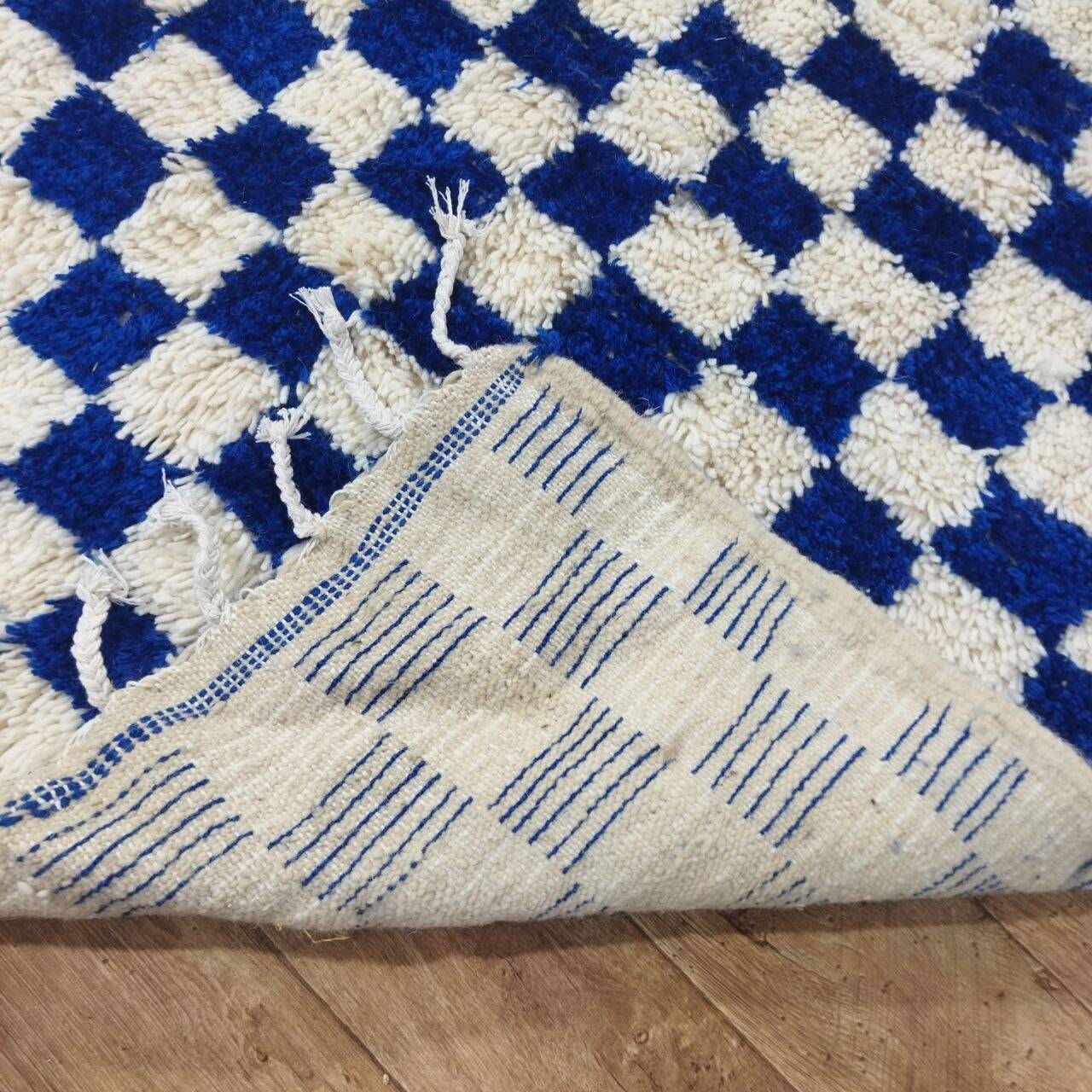 Moroccan Berber rug with a blue and ecru checkerboard pattern – 250 x 147 cm