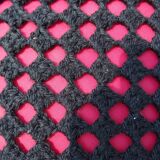 Wool cushion with vintage crochet