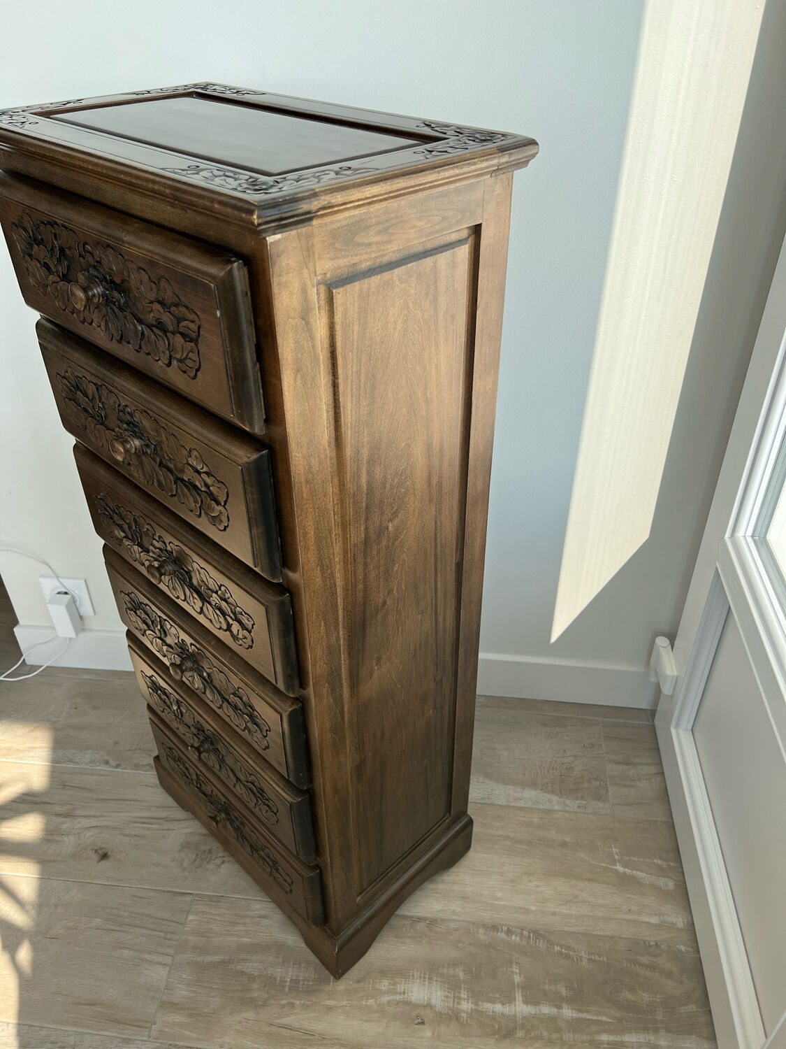 Carved wooden chiffonnier