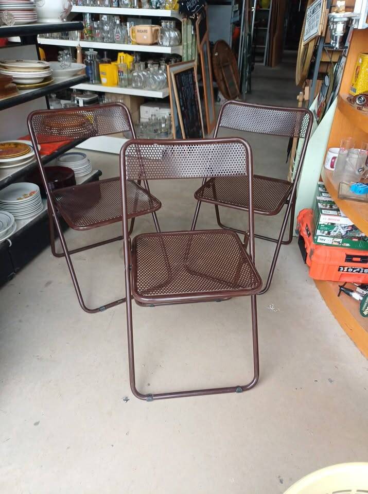 vintage perforated metal folding chair –