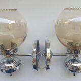 Pair of chrome metal wall lights with vintage sandblasted glass globes