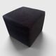 Minimalist square pouffe in black suede